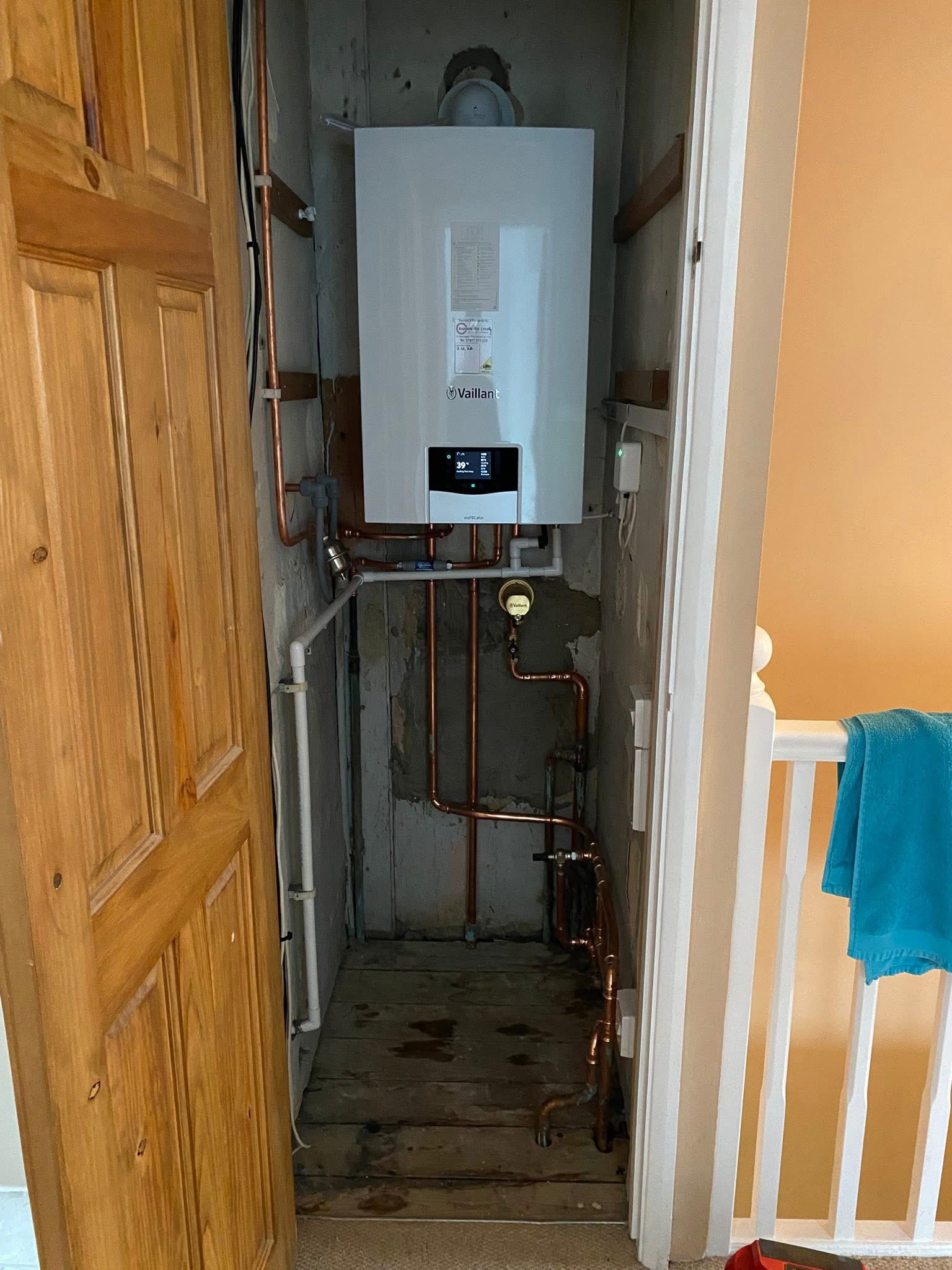 Vaillant boiler installation in cupboard